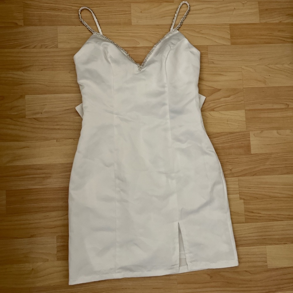 Fashion nova satin like dress with crystal straps and bow detail on back